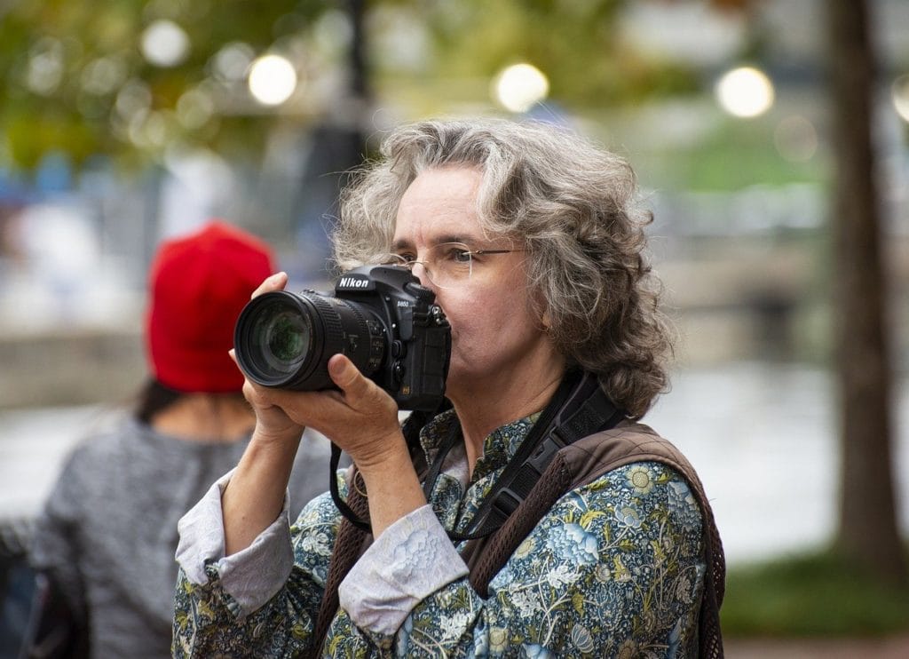woman using a dslr camera
