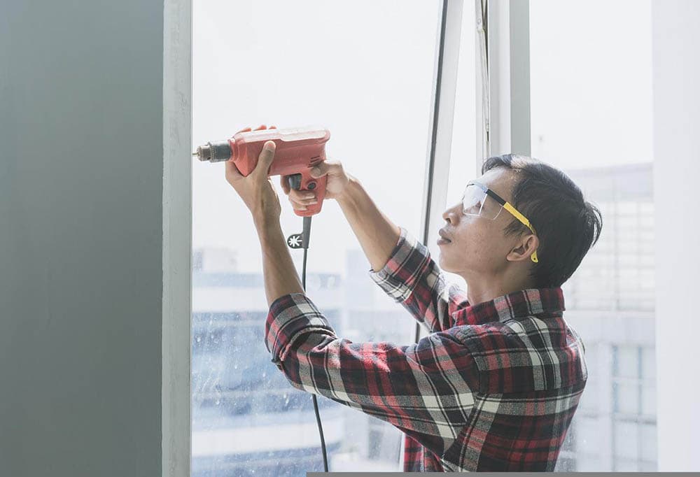 handyman wearing safety glasses