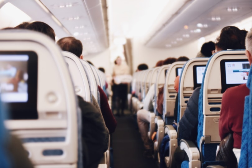 people sitting inside airplane