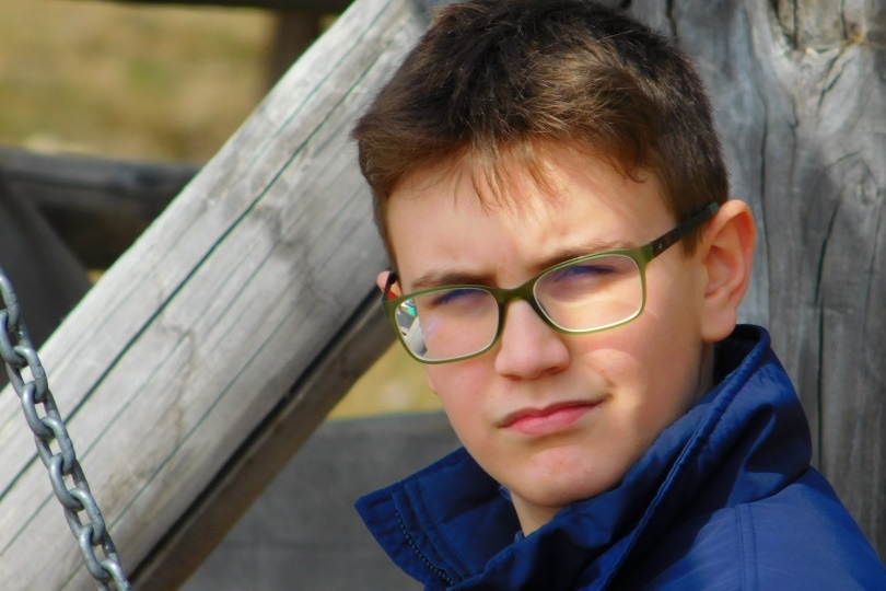 young boy wearing eye glasses