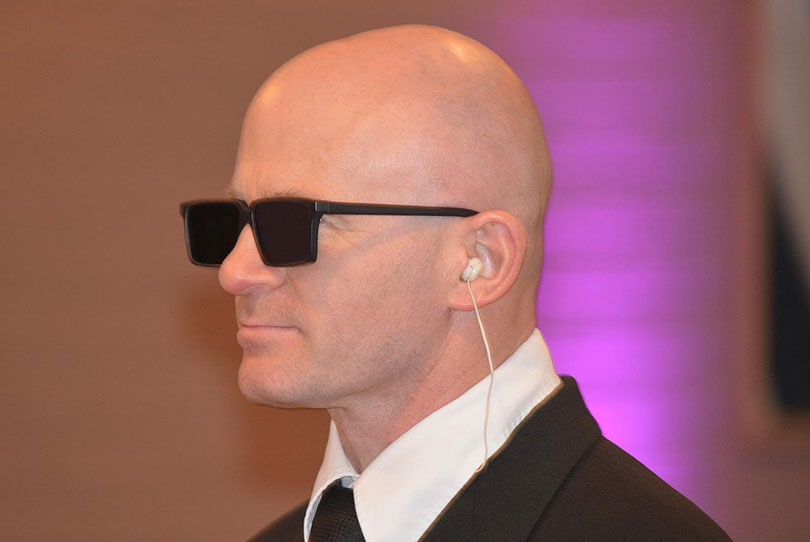 bodyguard wearing sunglasses
