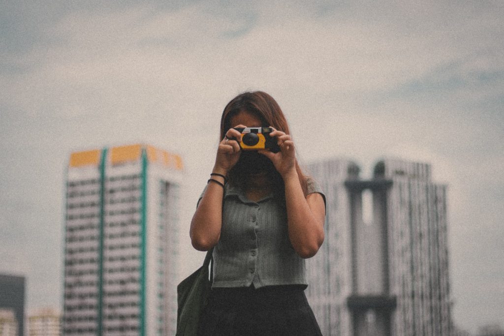 disposable camera woman