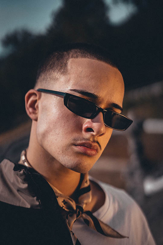 man wearing black rectangle sunglasses