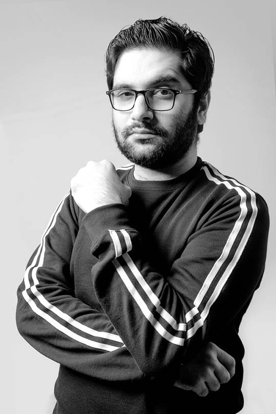 medium portrait of a man in black and white