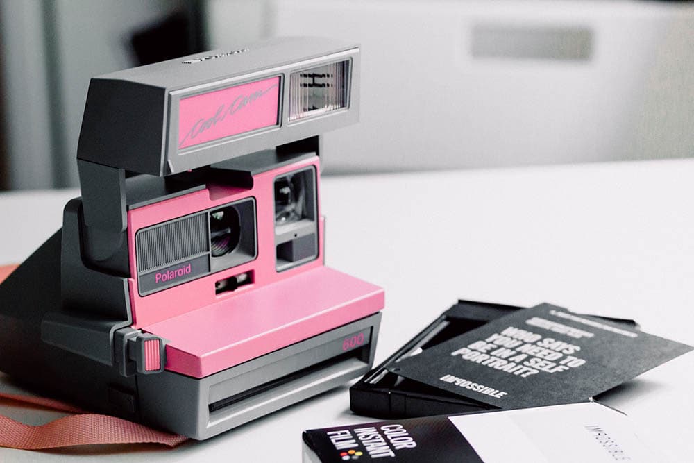 pink polaroid with cartridge