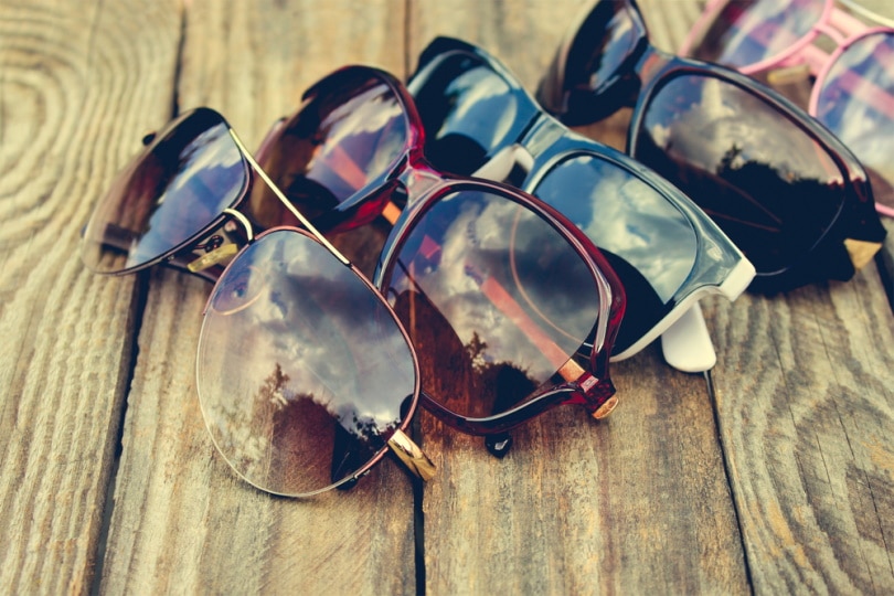 sunglasses on wooden table
