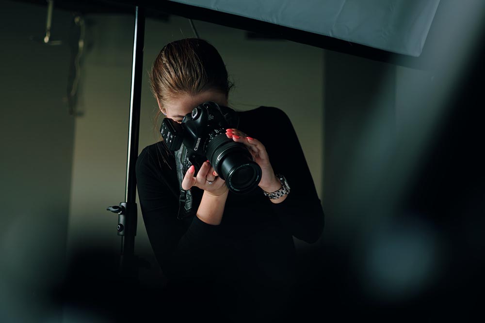 female photographer in the studio