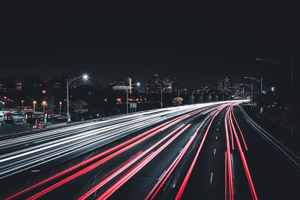 long exposure shot of cars on the road