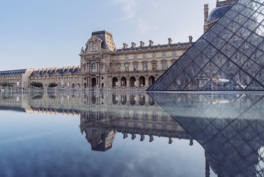 louvre museum reflecting on the water