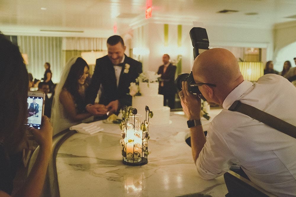 male wedding photographer at work