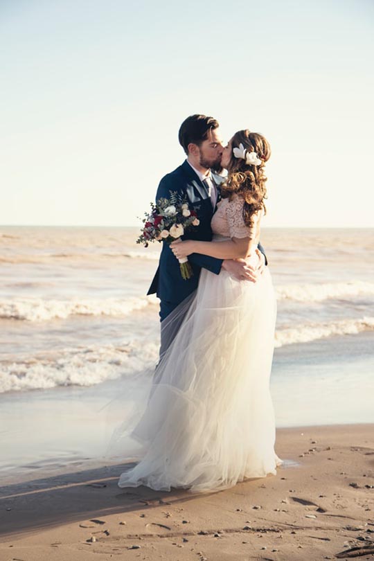 newlyweds at the beach