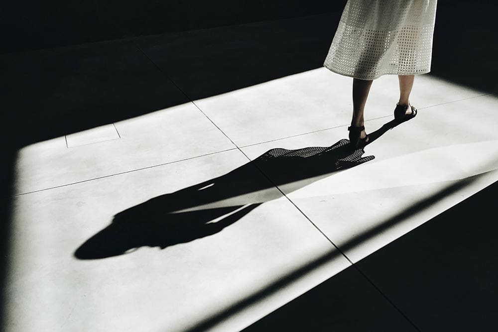 partial photo of a woman's shadow