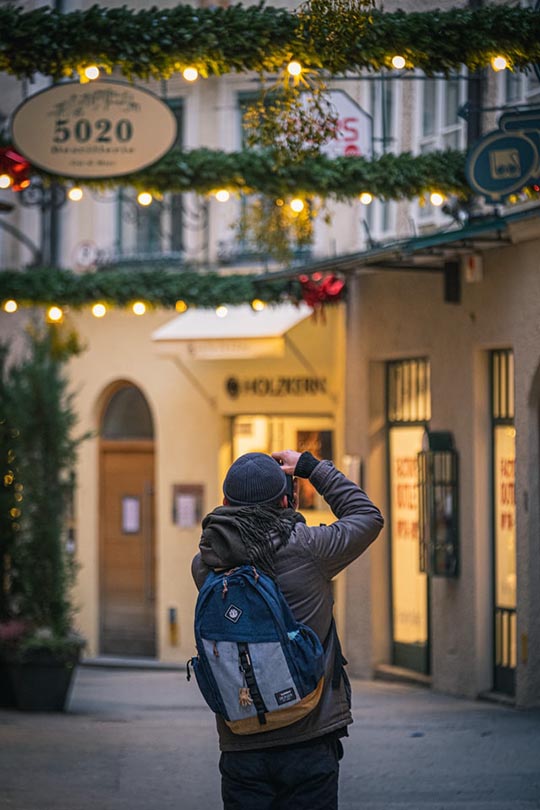 travel photographer taking photos of the alley