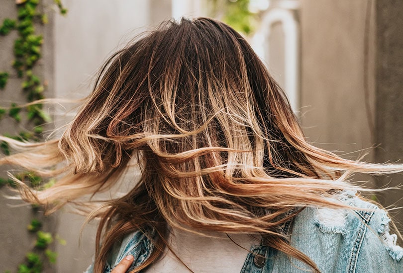 woman doing hair flip
