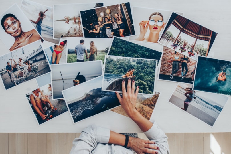 woman selecting photos