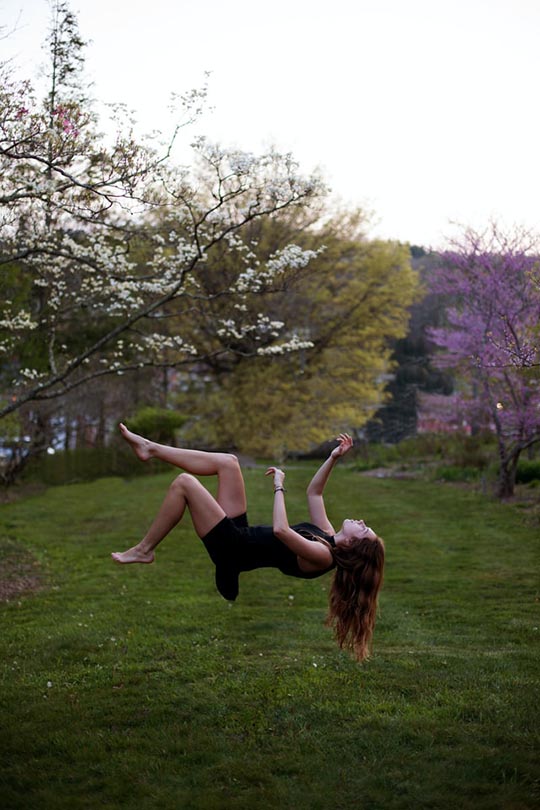 young woman floating in the air