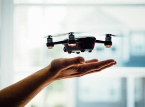 drone landing on a person's hand