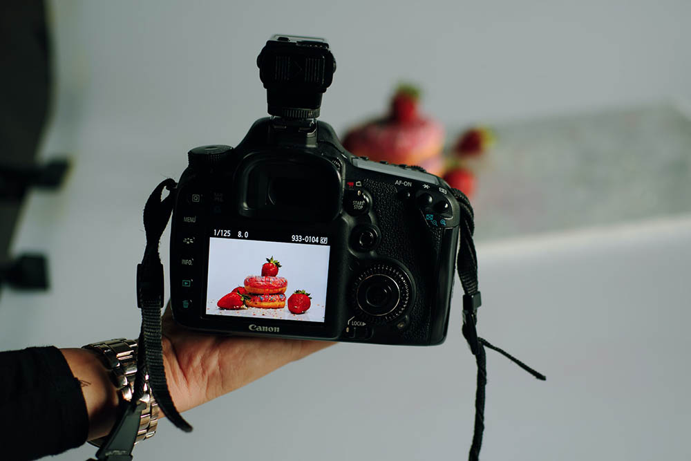 food photographer showing camera shot