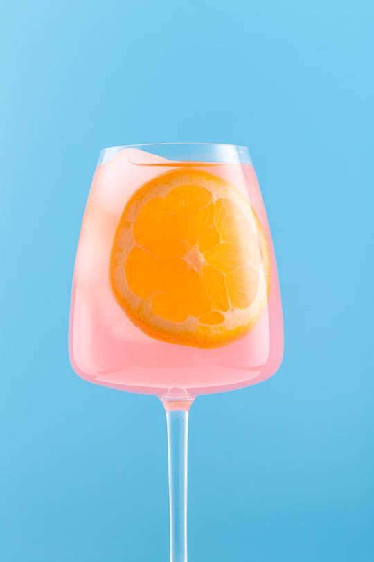 grapefruit sparkling water in a wine glass