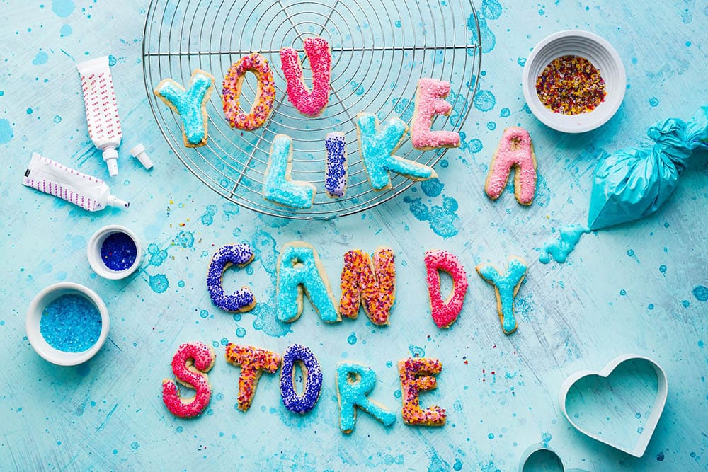 letter sugar cookies with colorful sprinkles