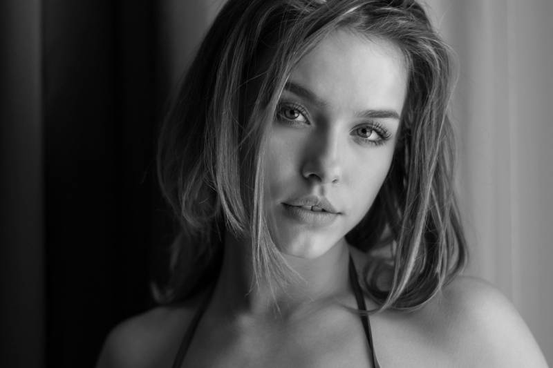 a black and white portrait of a beautiful woman