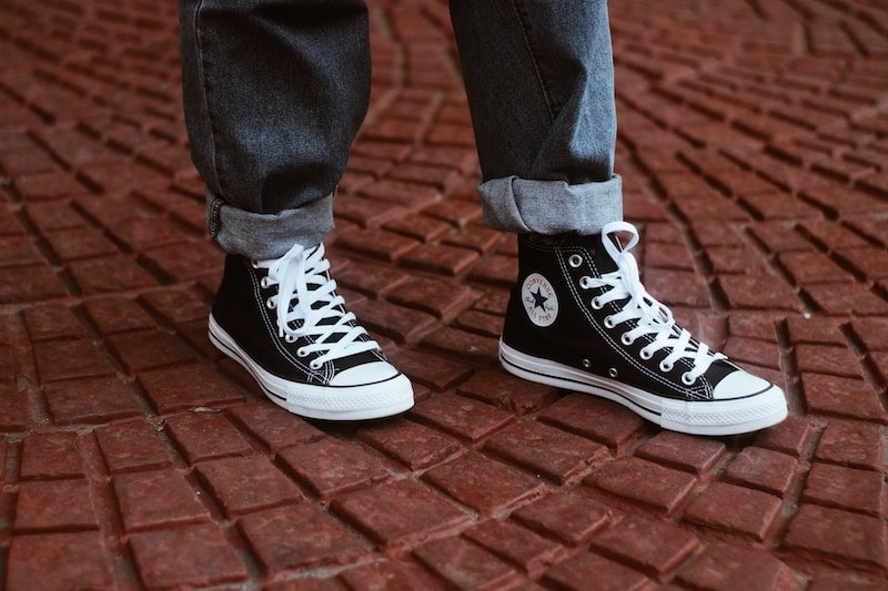 converse sneakers on patterned floor