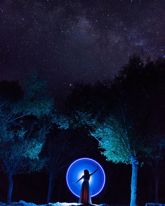 light painting of a woman with halo on her back