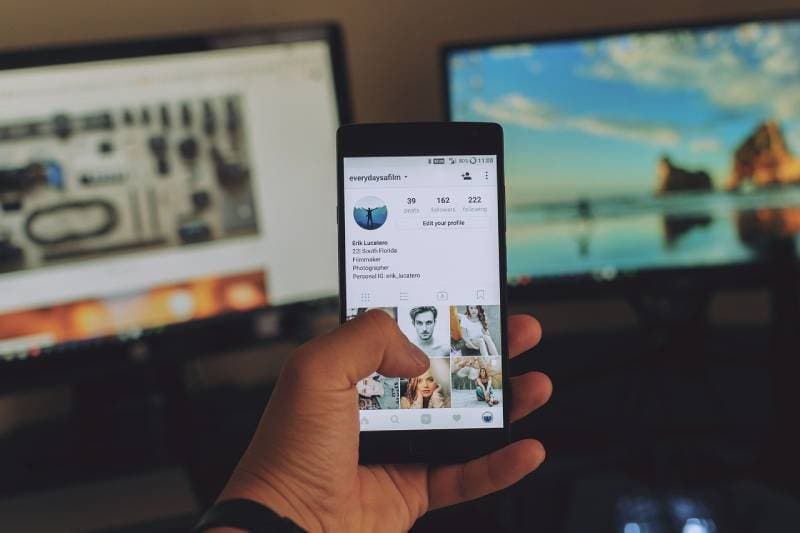 man going through social media