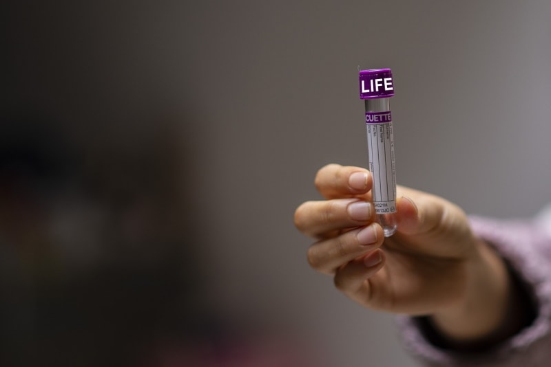 Scientist holding a test tube