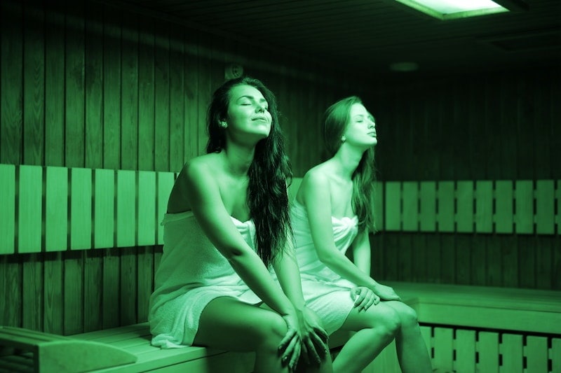 Two women enjoying relaxing sauna