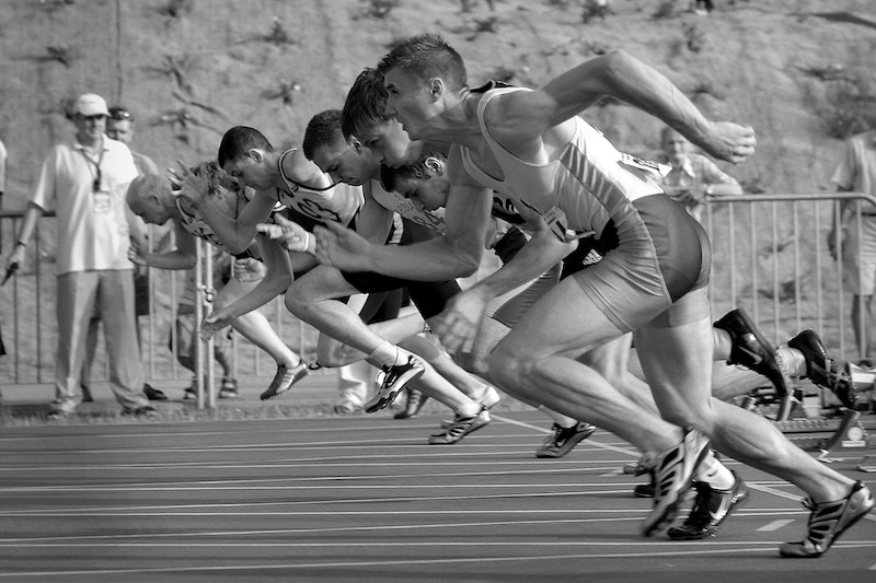 Grayscale photo of a race starting line