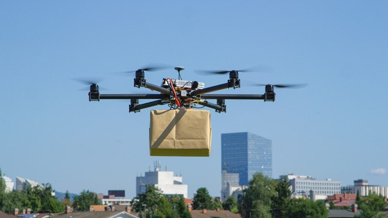 UAV drone delivering big package