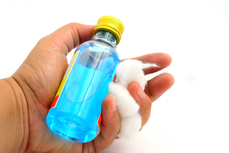 Isopropyl alcohol and cotton balls
